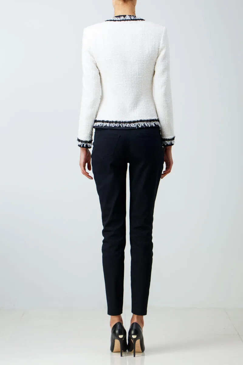 White tweed jacket with contrasting trim